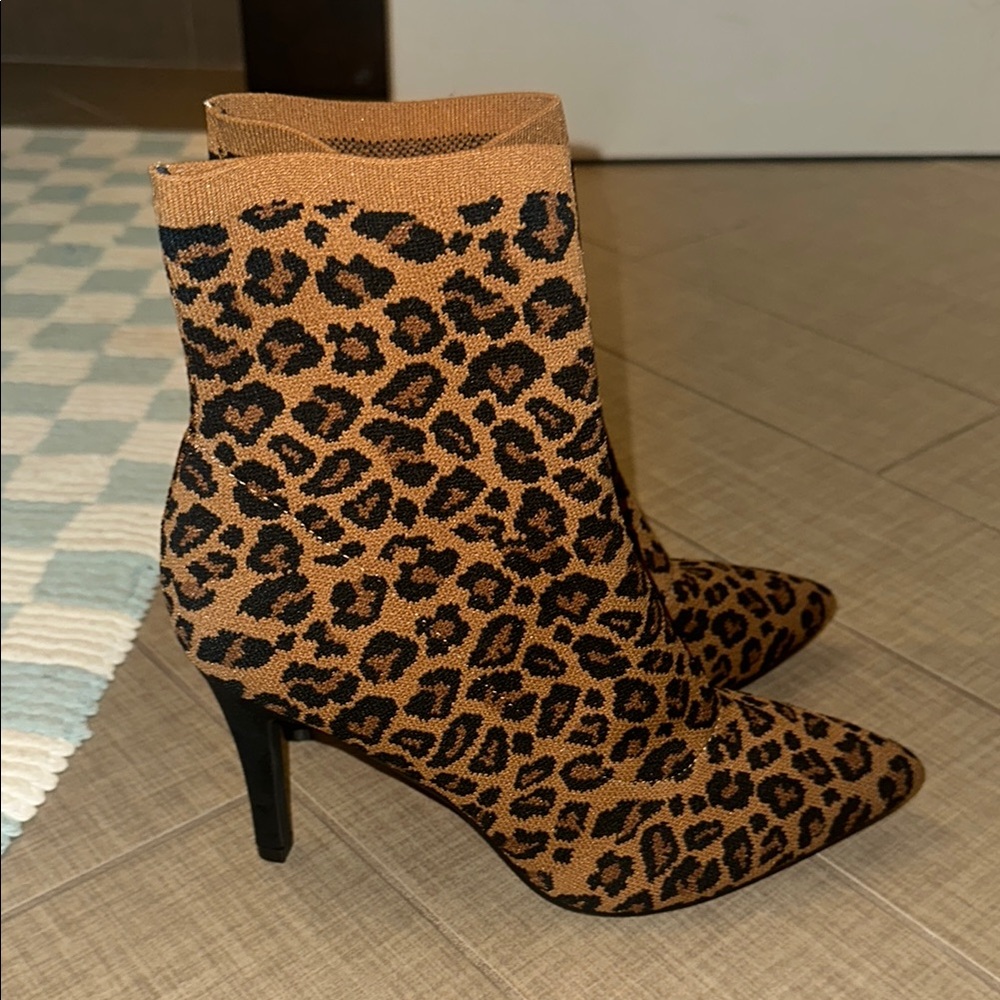New Brown and Black Heeled Boots with Sleek Silhouette - Never Worn
